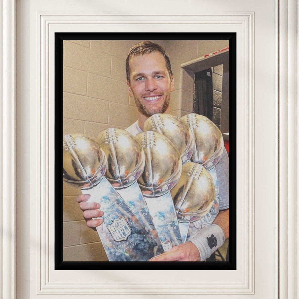 Tom Brady poster displayed in a stylish setting, perfectly highlighting its vibrant design.