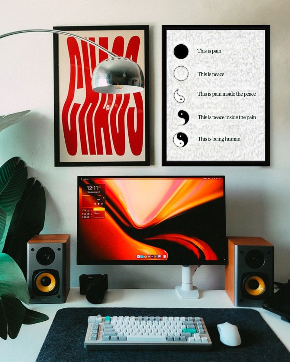 The Yin Yang of Pain and Peace poster showcased in a contemporary home office setting.