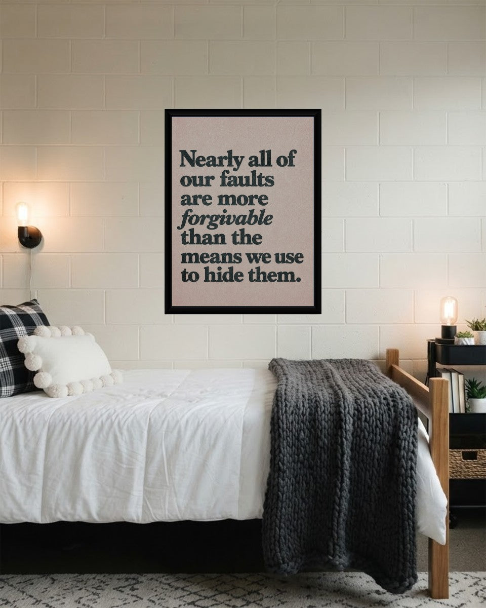 The 'Forgivable Faults Poster' in a chic, modern workspace environment.