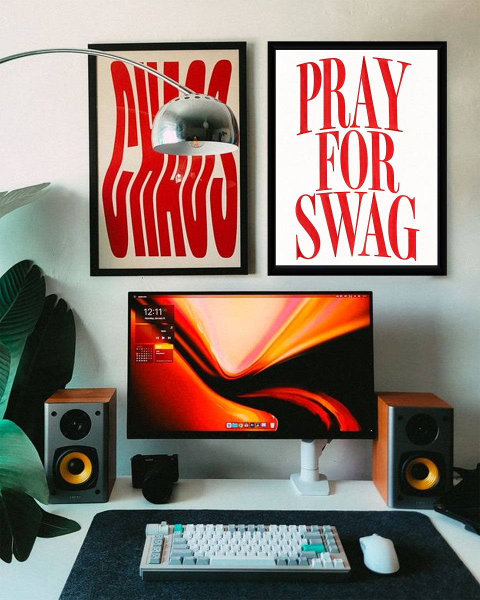 The 'Pray for Swag' poster displayed in a vibrant, styled room environment.