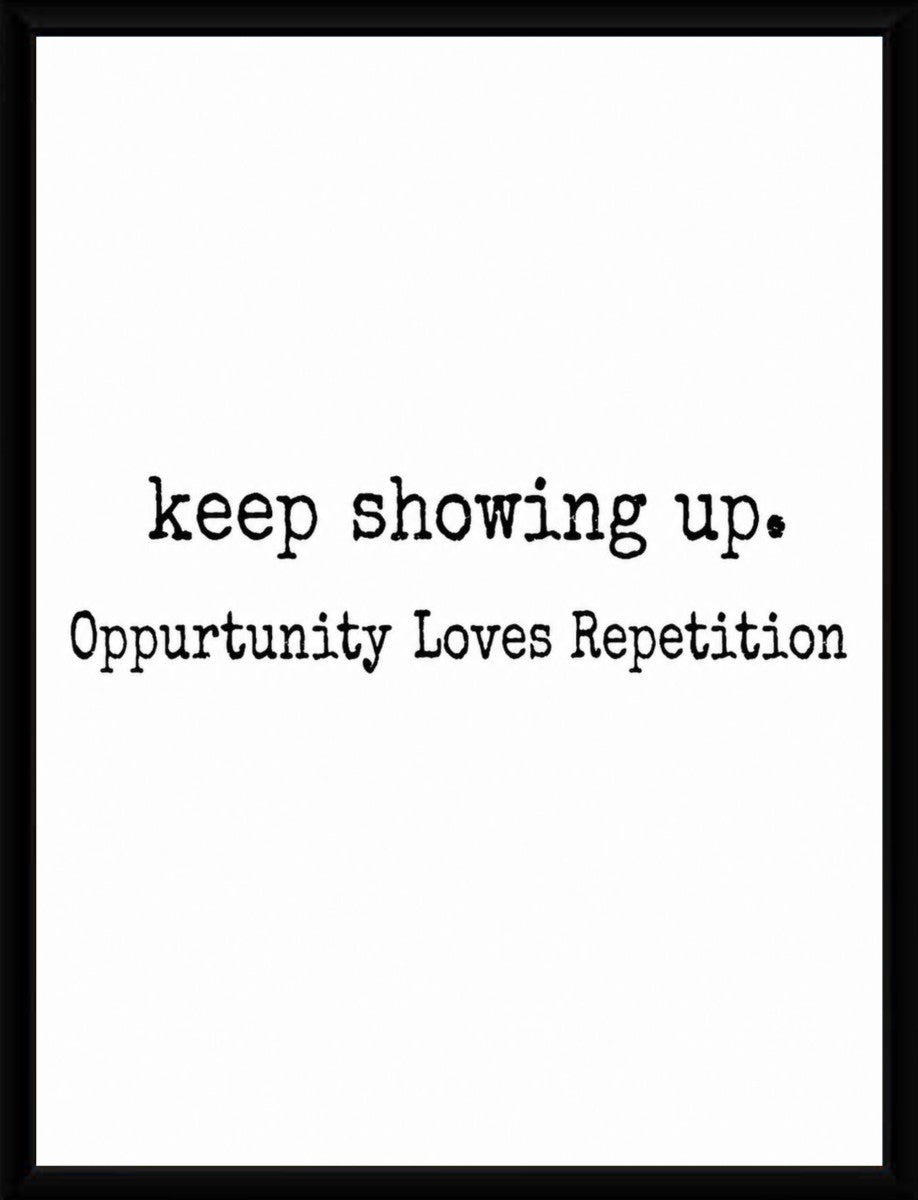 The 'Keep Showing Up' poster in a sleek, modern frame showcasing its motivational quote.