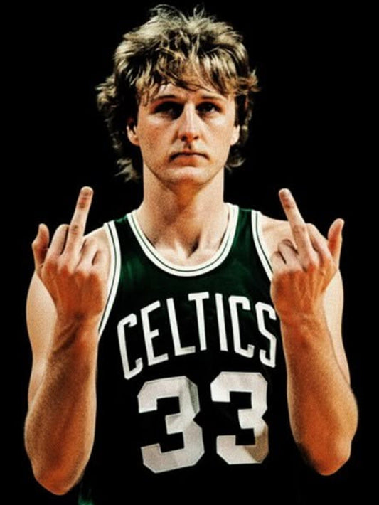 A striking poster of basketball legend Larry Bird displaying intense charisma.